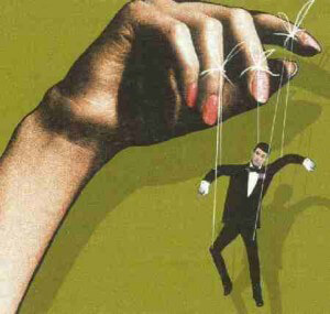 A woman puppeteering her man